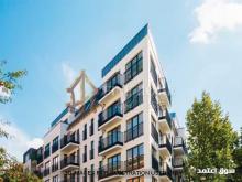 بنايه تجاريه مميزه شارعين 8 محلات 16 شقة في معسكر ال نهيان