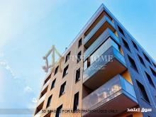 بناية تجارية  2 محل 12 شقة دخل مميز في مصفح